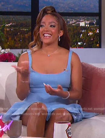 Mickey Guyton’s blue fit and flare dress on The Jennifer Hudson Show