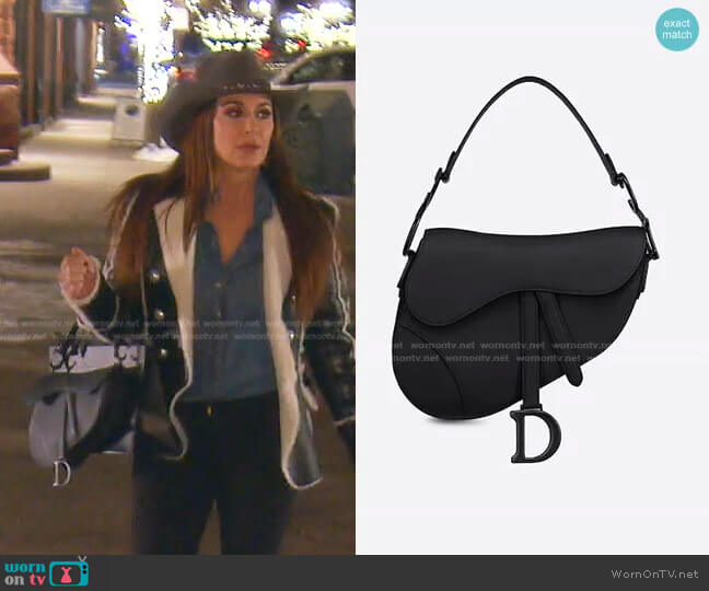 Dior Saddle Bag in Black Ultramatte worn by Kyle Richards on The Real Housewives of Beverly Hills