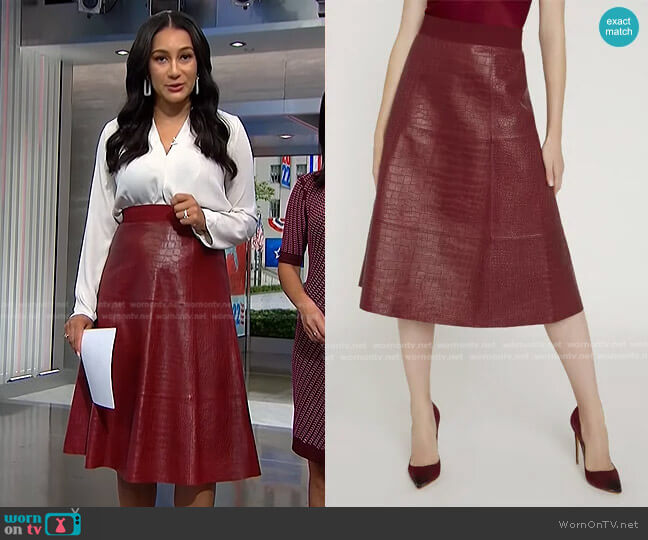 Alice + Olivia Sosie Croc Leather Midi Skirt worn by Morgan Radford on NBC News Daily