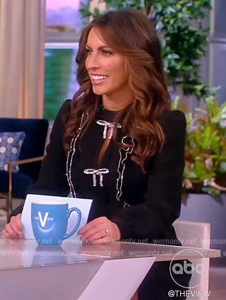 Alyssa’s black embellished bow mini dress on The View