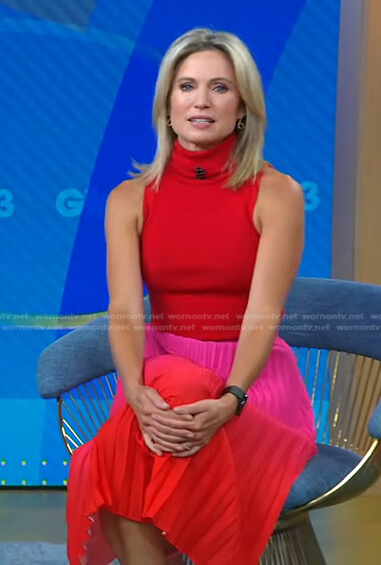Amy's red turtleneck top and pleated skirt on Good Morning America