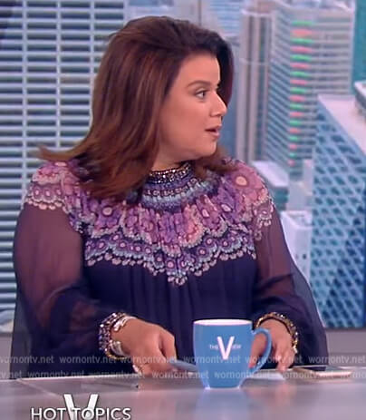 Ana’s purple floral print sheer blouse on The View