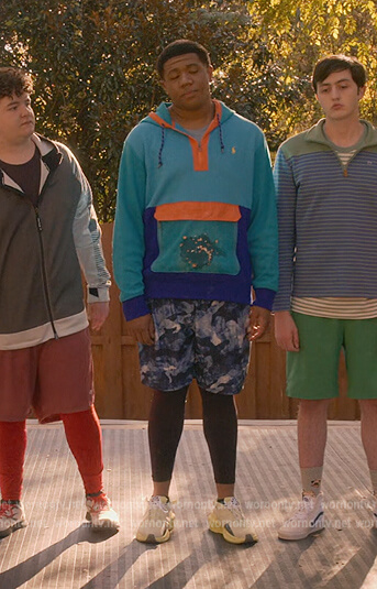 Blue colorblock hoodie and yellow sneakers on Cobra Kai