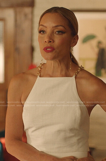 Dominique's white chain strap top on Dynasty