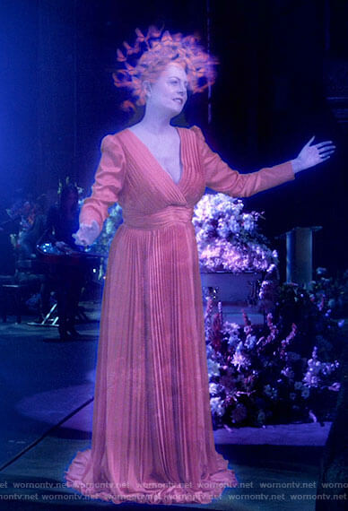 Dottie's orange pleated hologram gown on Monarch