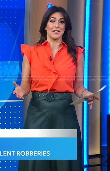 Erielle’s orange ruffle top and green belted skirt on Good Morning America