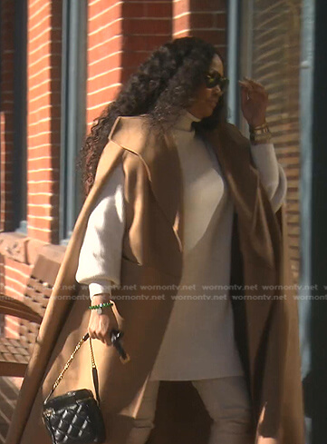 Garcelle’s beige cape coat on The Real Housewives of Beverly Hills