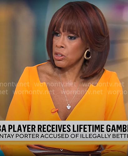 Gayle King’s orange v-neck dress on CBS Mornings