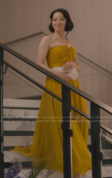 Ingrid’s yellow strapless gown on Partner Track