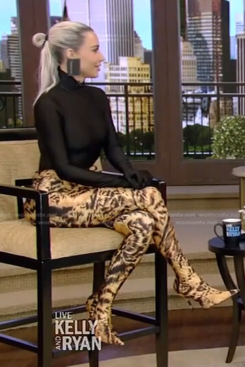 Kim Kardashian’s black turtleneck top and animal print pants on Live with Kelly and Ryan
