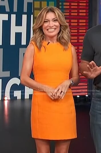 Kit’s orange textured sleeveless dress on Access Hollywood