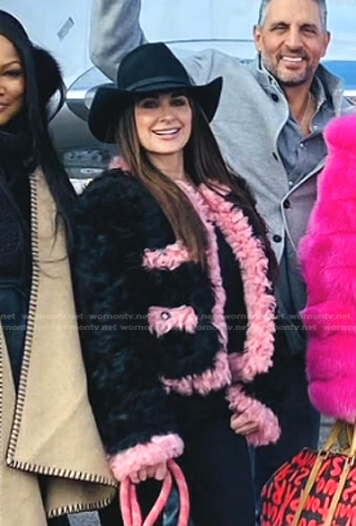 Kyle’s black and pink contrast trim fur jacket on The Real Housewives of Beverly Hills