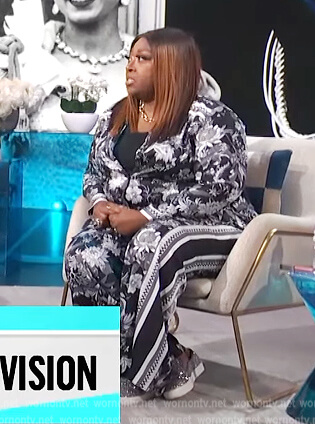 Loni's black floral print blouse and pants on E! News Daily Pop