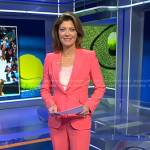 Norah’s pink blazer and trousers on CBS Evening News