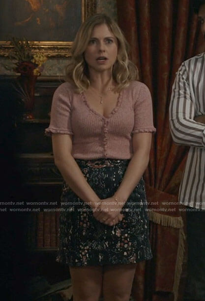 Sam's blush pink ruffle-trim cardigan and floral skirt on Ghosts