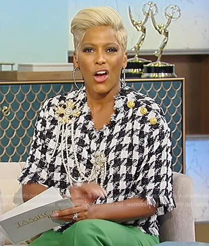 Tamron's houndstooth brooch embellished top on Tamron Hall Show