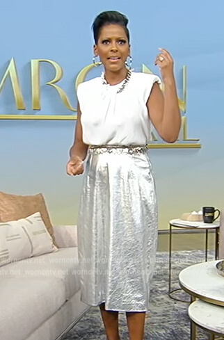 Tamron’s white chain embellished top and skirt on Tamron Hall Show