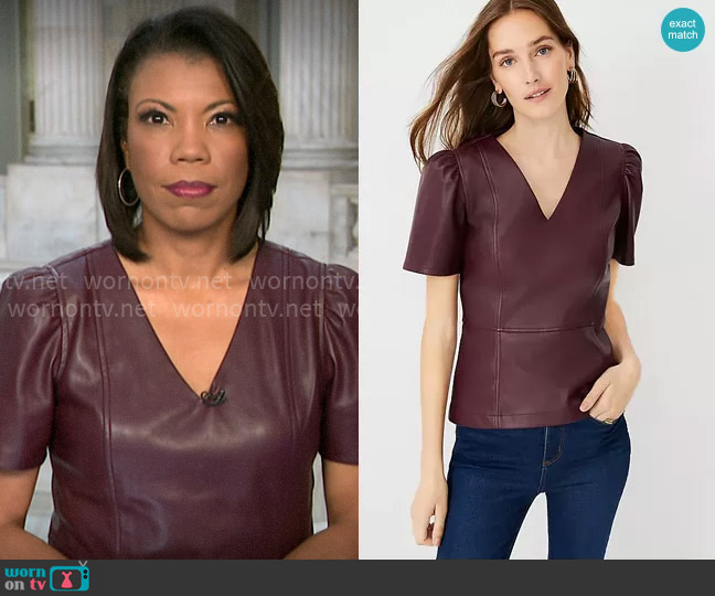 Ann Taylor Faux Leather Puff Sleeve Peplum Top in Mauve Rose worn by Nikole Killion on CBS Mornings