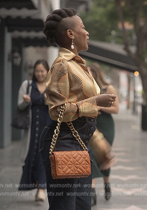 Autumn's orange quilted bag on Reasonable Doubt