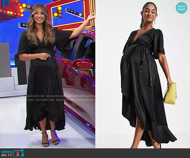 Flounce London Maternity wrap front midi dress with flutter sleeves in black satin worn by Manuela Arbeláez on The Price is Right