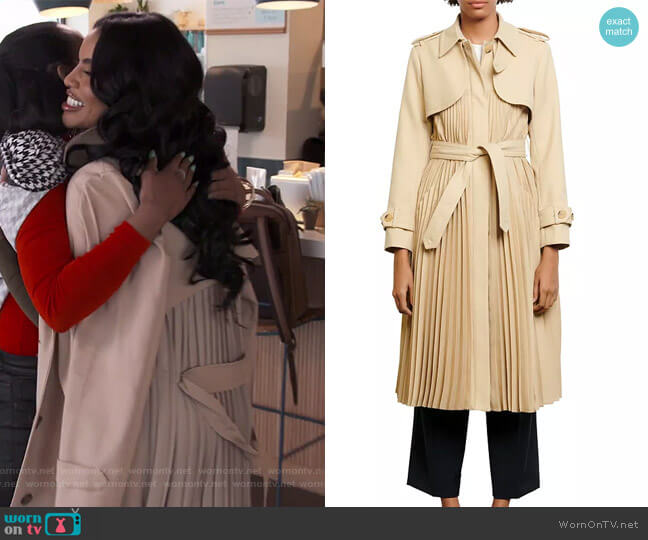 Sandro Vino pleated trench coat worn by Mia Thornton on The Real Housewives of Potomac