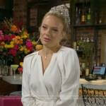 Abby’s white long sleeved mini wrap dress on The Young and the Restless