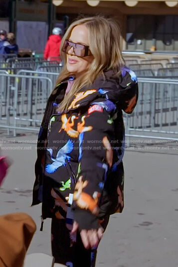 Angie's black bird print puffer jacket and pants on The Real Housewives of Salt Lake City