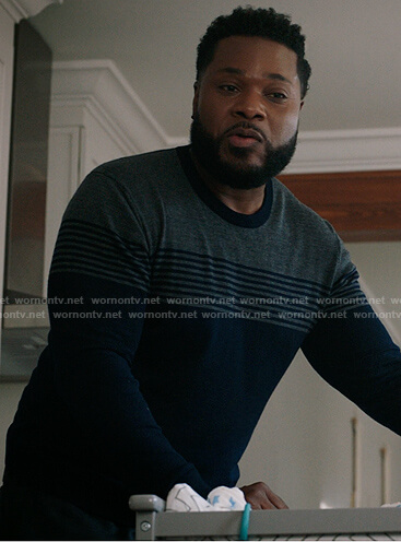 AJ’s navy and grey striped sweater on The Resident