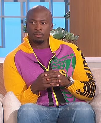 Akbar’s colorblock smiley face sweater on The Talk