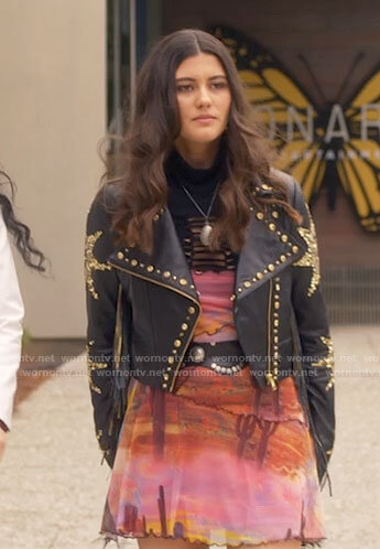 Ana's cactus print dress and star studded leather jacket on Monarch