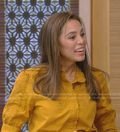 Dr. Holly Phillips’s orange embroidered top on Live with Kelly and Ryan