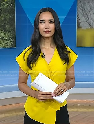 Emilie Ikeda’s yellow twist short sleeve top on Today