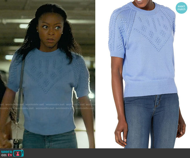 Zora’s blue short sleeve sweater on From Scratch