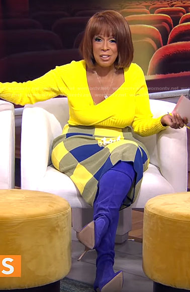 Gayle King's yellow asymmetric sweater and blue checked skirt on CBS Mornings