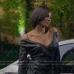 Jax’s black off-shoulder leather dress on Reasonable Doubt