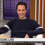 Jim Parson’s navy sweater with striped sleeves on CBS Mornings