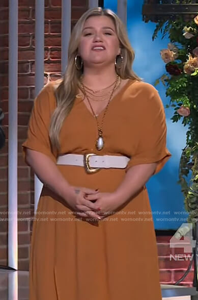 Kelly’s orange metallic wrap dress on The Kelly Clarkson Show