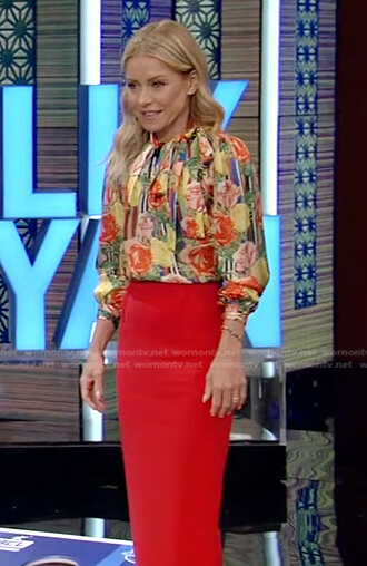 Kelly’s floral tie neck blouse and red pencil skirt on Live with Kelly and Ryan