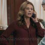 Kit’s burgundy tie neck blouse on The Resident