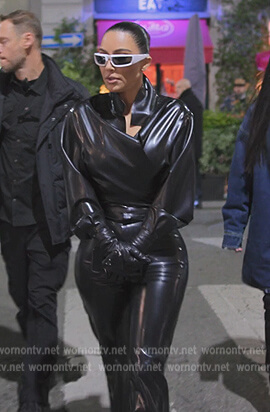 Kim’s black latex shirt and pants on The Kardashians
