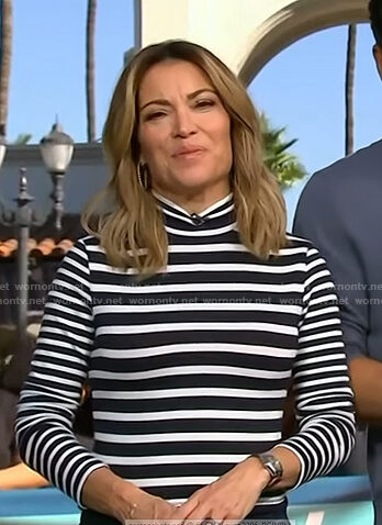 Kit’s black striped turtleneck top on Access Hollywood