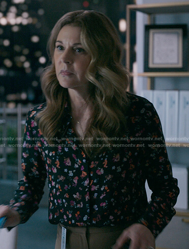 Kit's black floral button down blouse on The Resident