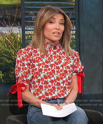 Kit’s red and blue floral top on Access Hollywood