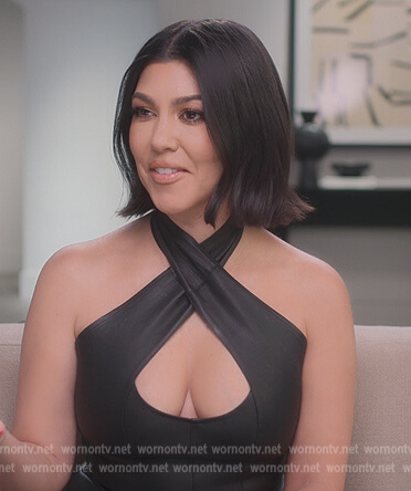 Kourtney’s black cross neck top on The Kardashians