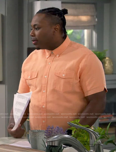 Marty's orange button down shirt on The Neighborhood