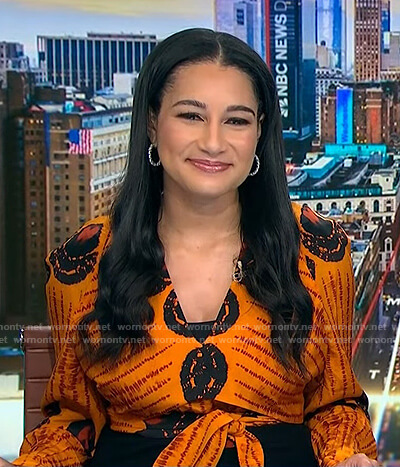 Morgan's orange printed v-neck top on NBC News Daily