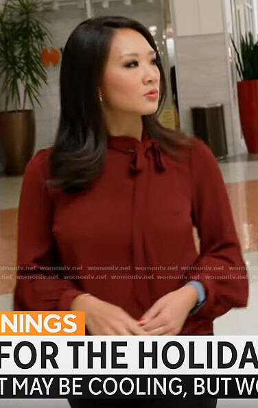 Nancy Chen’s red tie neck blouse on CBS Mornings