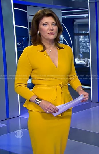 Norah's yellow wrap peplum jacket and skirt on CBS Evening News