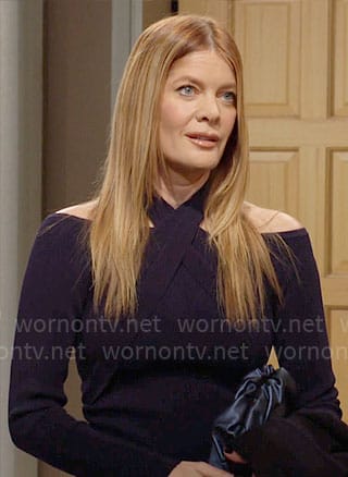 Phyllis’s navy cross-neck knit top on The Young and the Restless