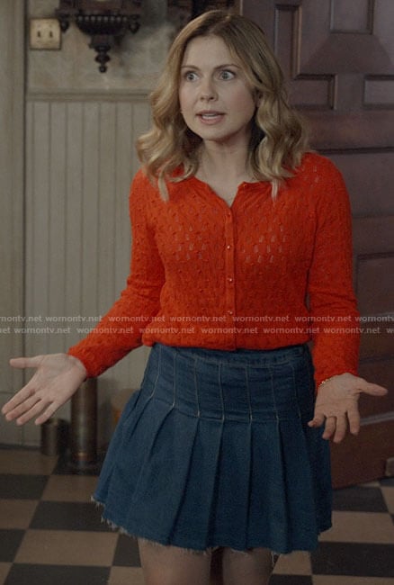 Sam's red pointelle cardigan and pleated denim skirt on Ghosts